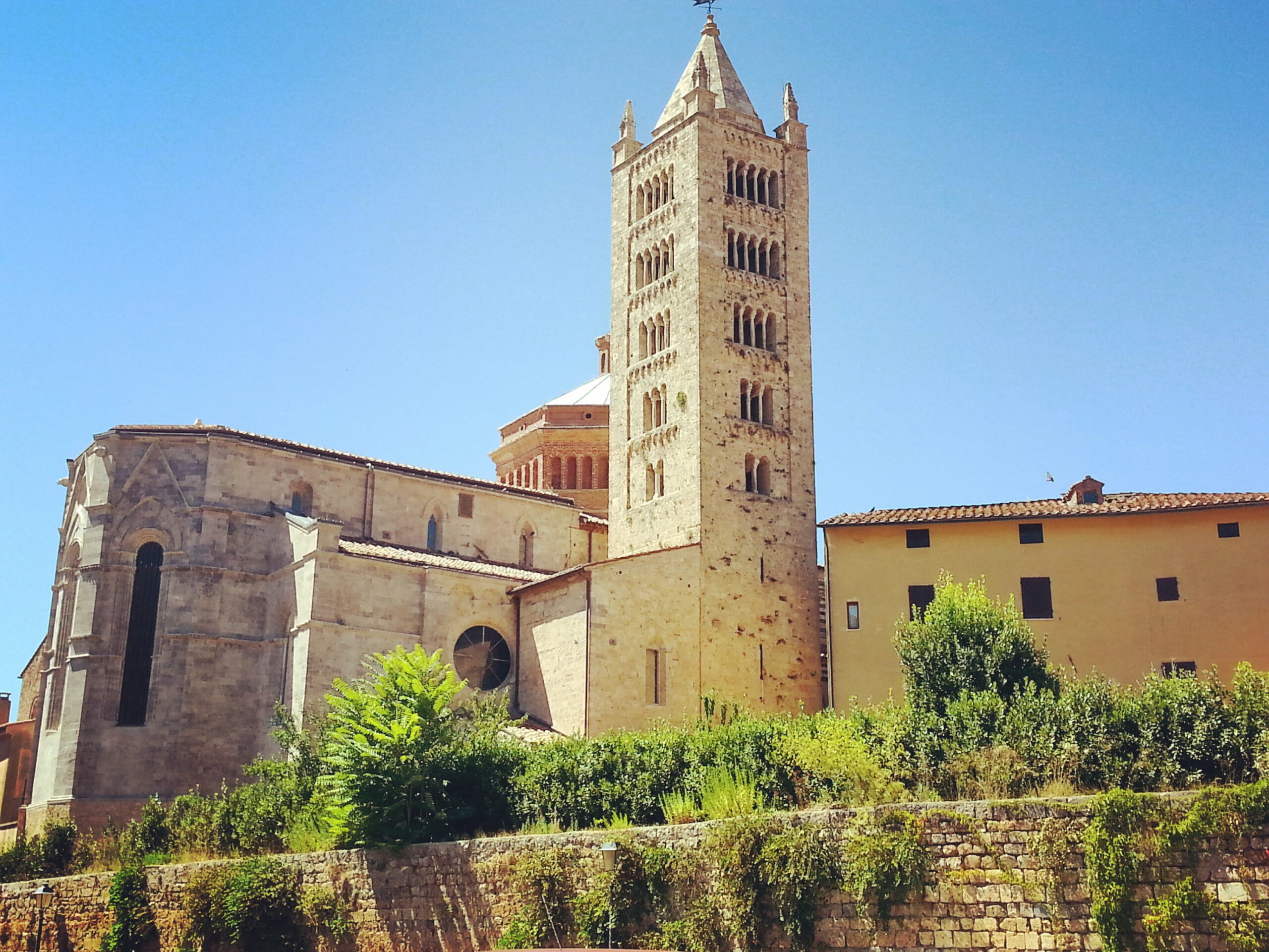 Old village and church while cycling in Tuscany